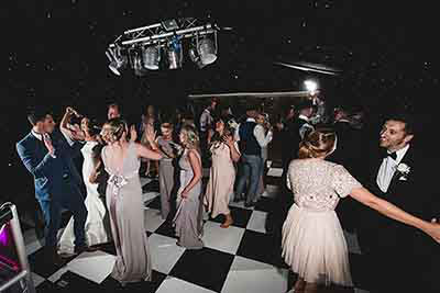 Wedding Party Guests On The Dancefloor At The Old Hall Ely Cambridge